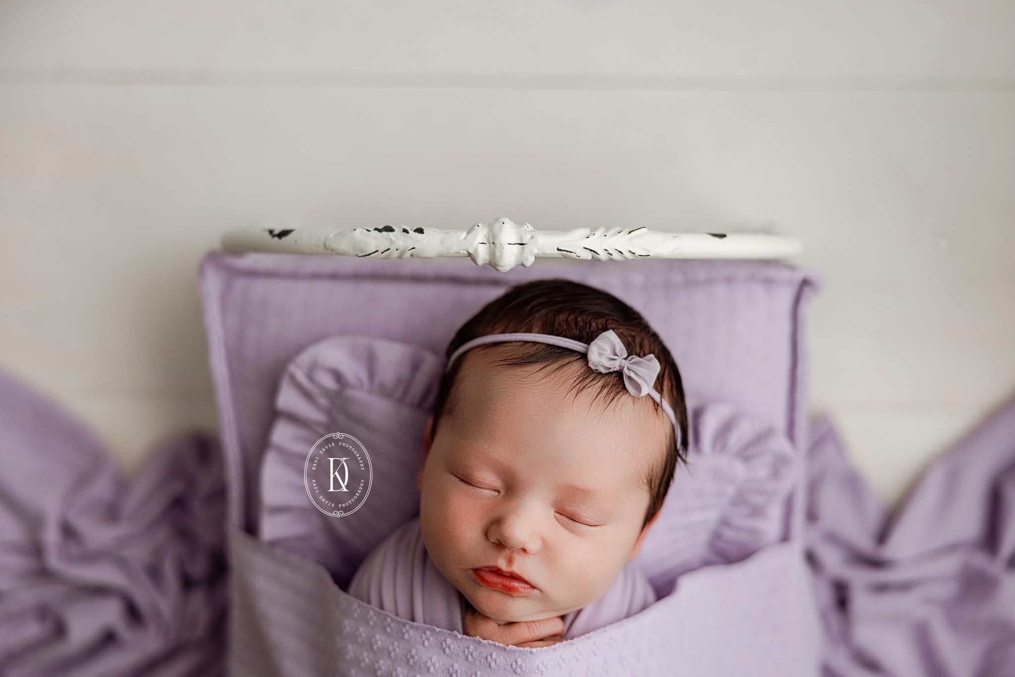 Chandler Albino Geode a light purple newborn photography backdrop draped on a posing table or beanbag, that is a smooth, stretchy and soft fabric for beautiful baby portraits. Credit Kadi Davis Photography